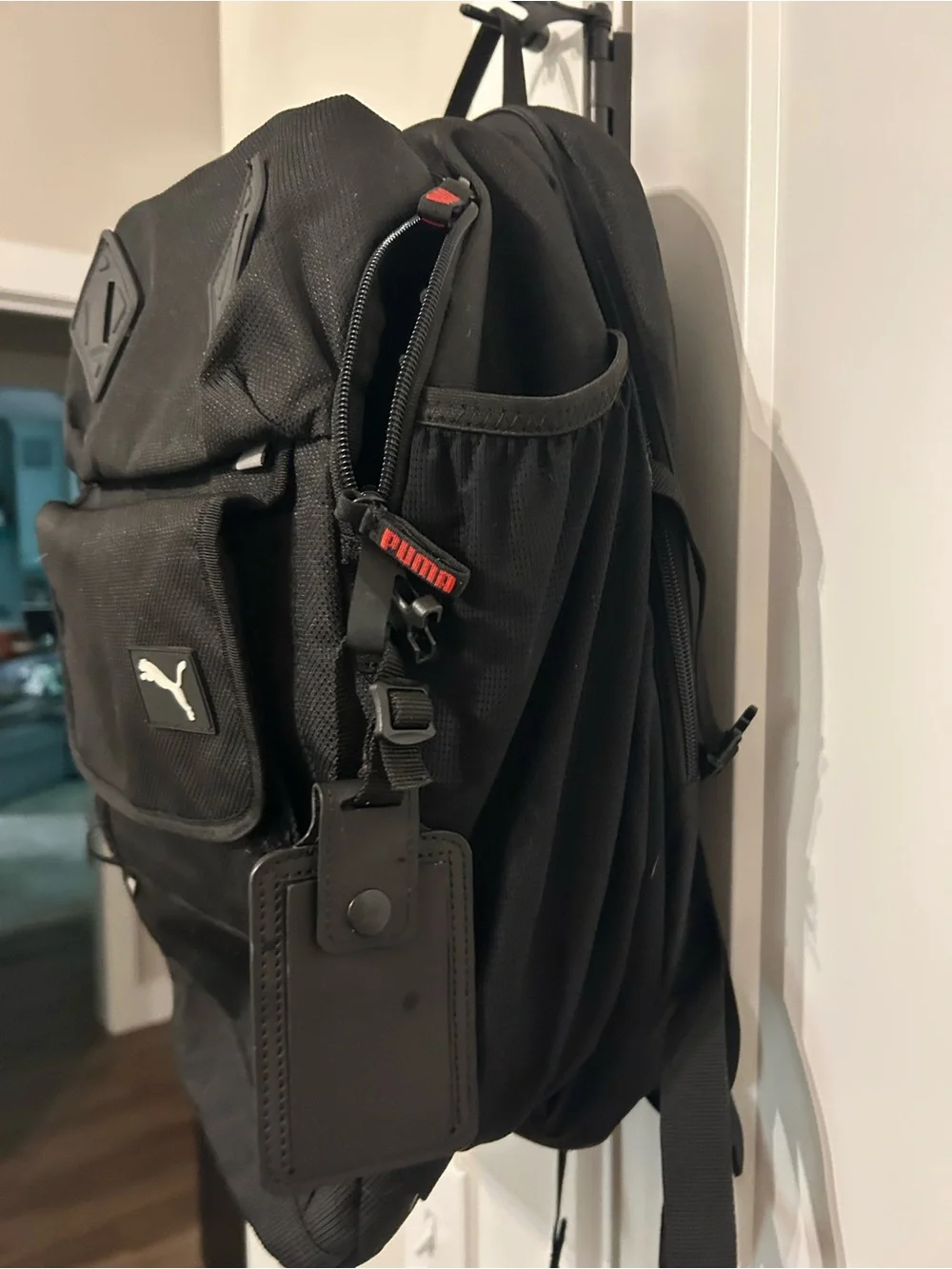 Puma Black Backpack with Red Accent Zippers